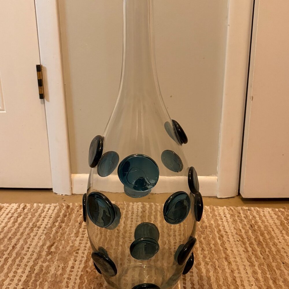 Blown glass vase with blue glass polkadots